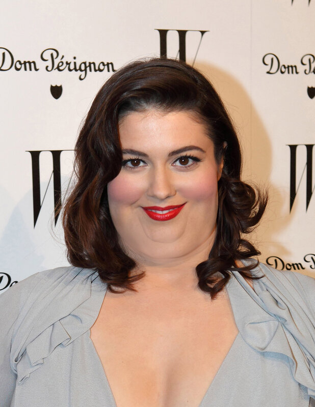 woman with red lipstick at event