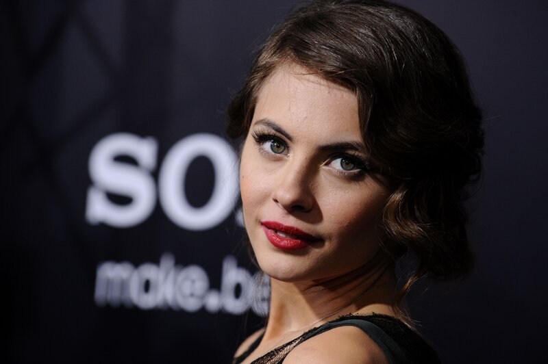 woman with red lipstick at event