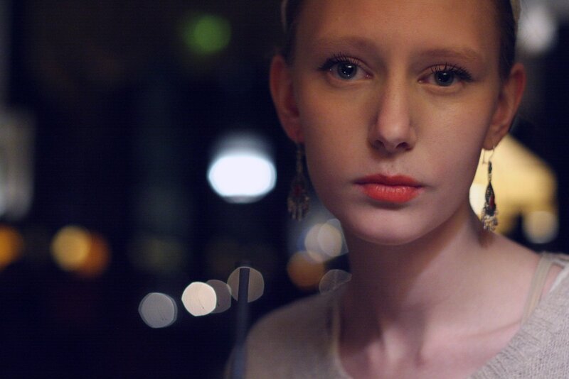 woman with red lipstick at night