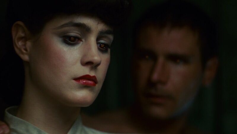 woman with red lipstick in dim light