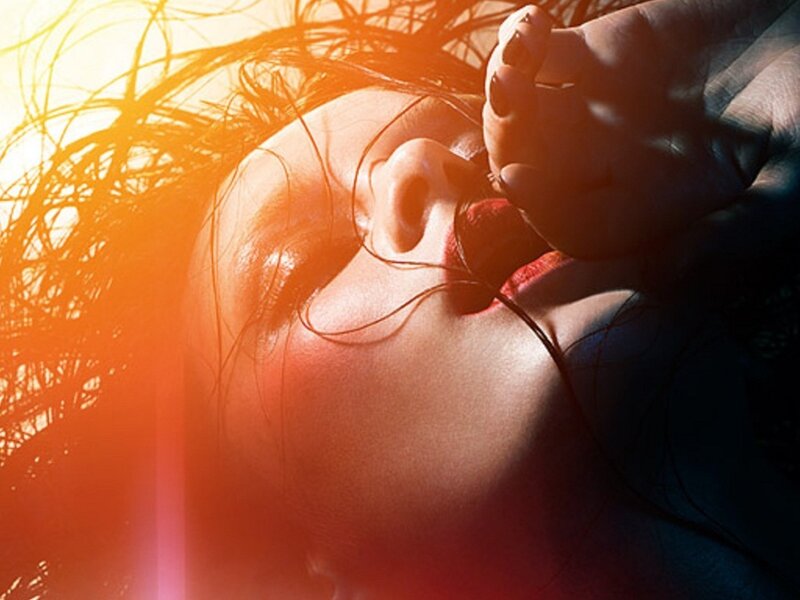 woman with red lipstick in sunlight