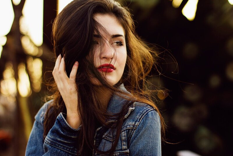 woman with red lipstick in wind