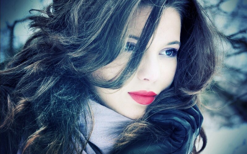 woman with red lipstick in winter