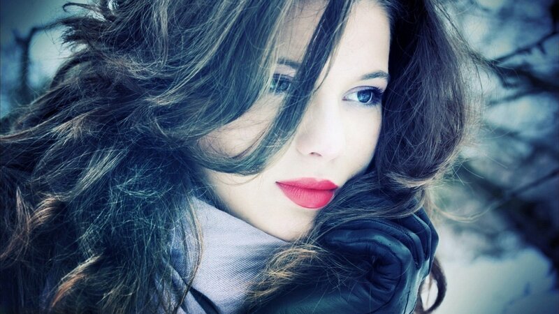 woman with red lipstick in winter