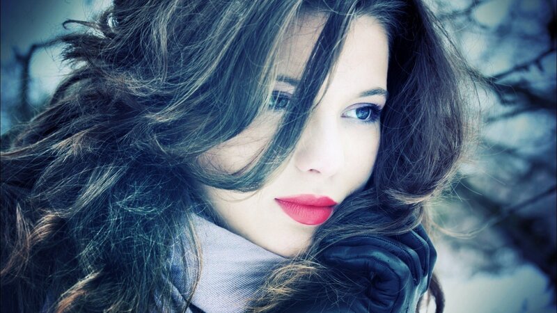 woman with red lipstick in winter