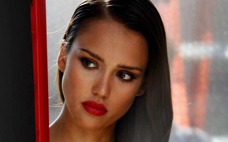 woman with red lipstick looking away