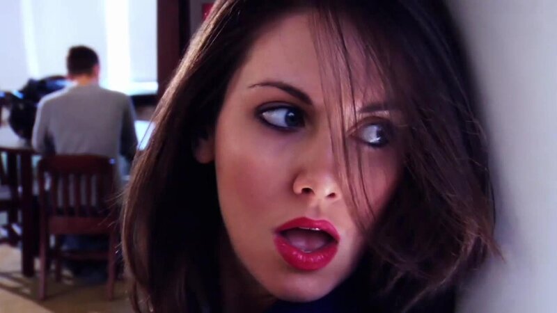 woman with red lipstick looking surprised