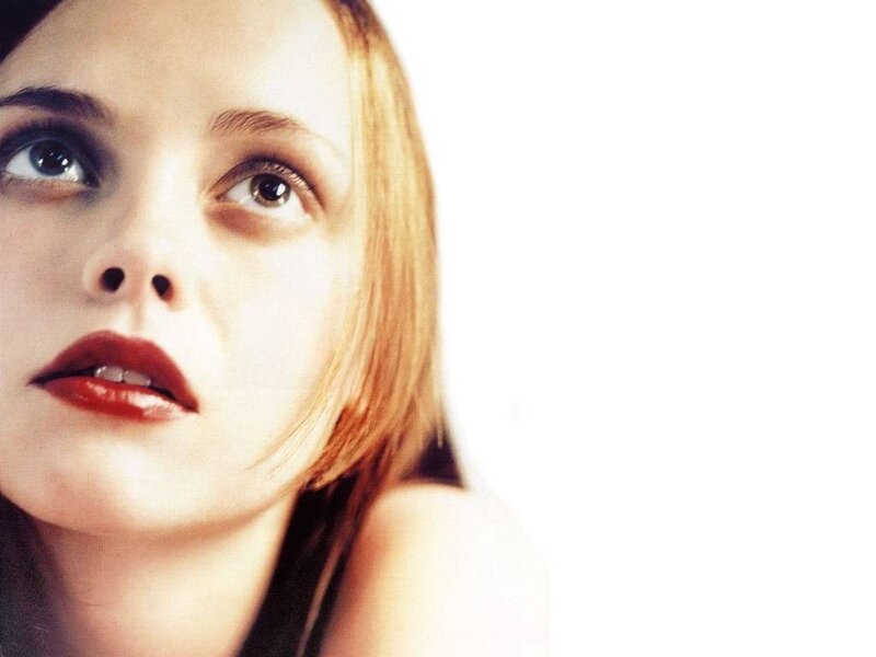 woman with red lipstick looking up