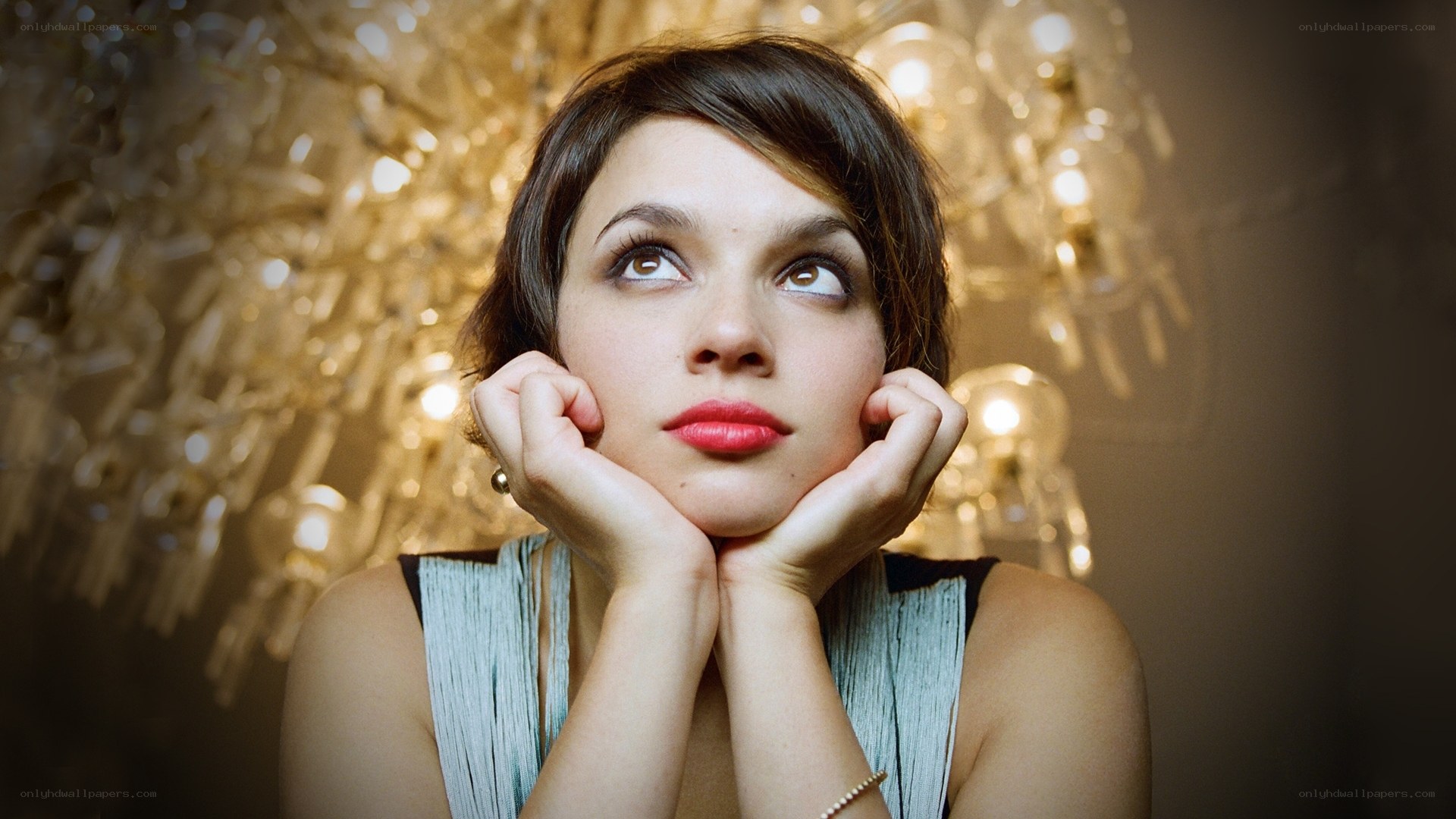 woman with red lipstick looking up