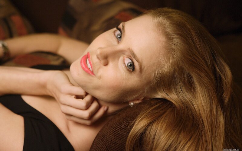 woman with red lipstick lying down