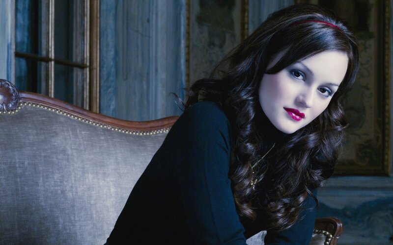 woman with red lipstick on couch