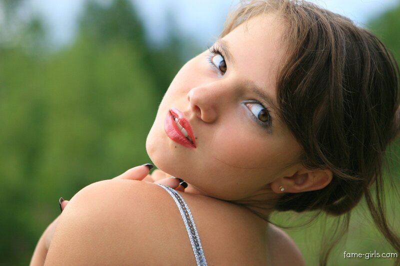 woman with red lipstick outdoors