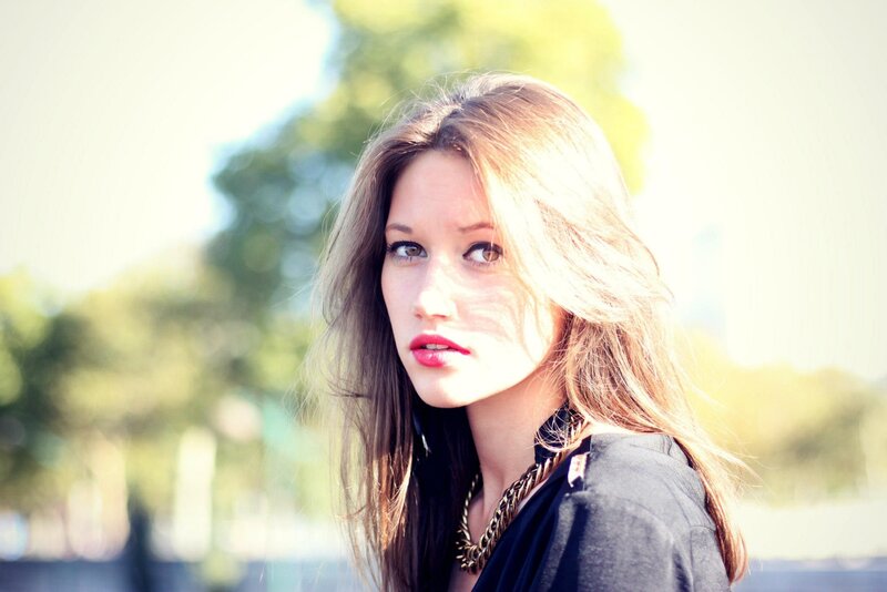 woman with red lipstick outdoors
