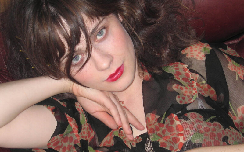 woman with red lipstick resting