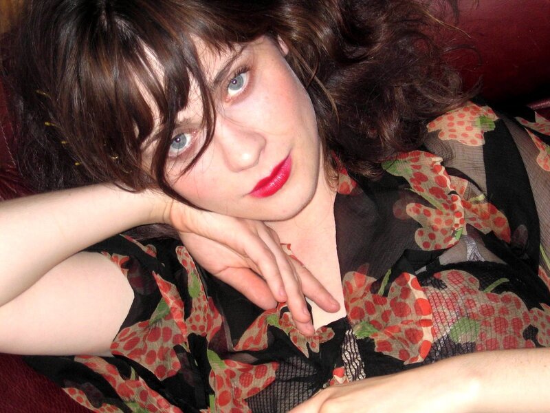 woman with red lipstick resting