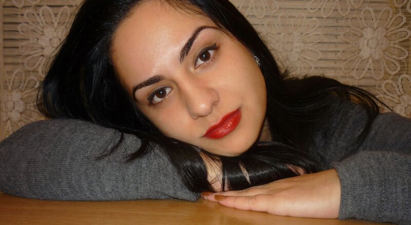 woman with red lipstick resting