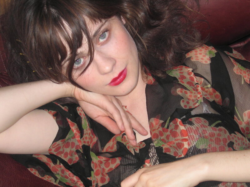 woman with red lipstick resting