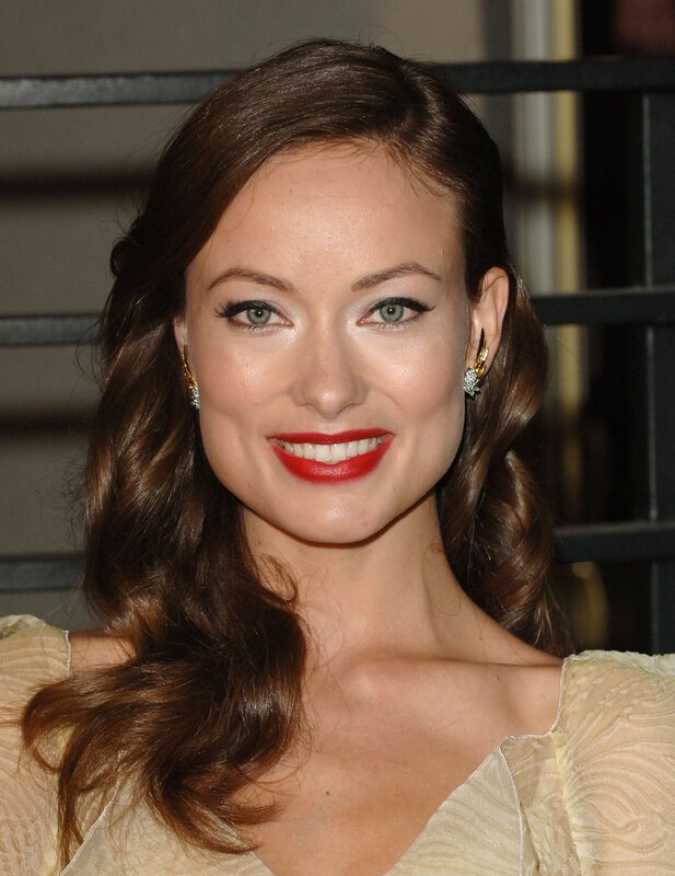 woman with red lipstick smiling