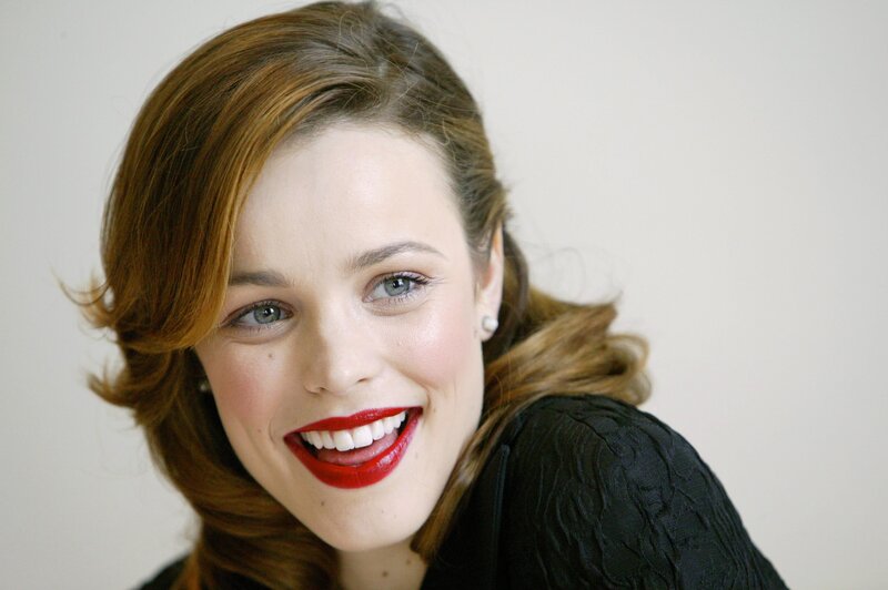 woman with red lipstick smiling