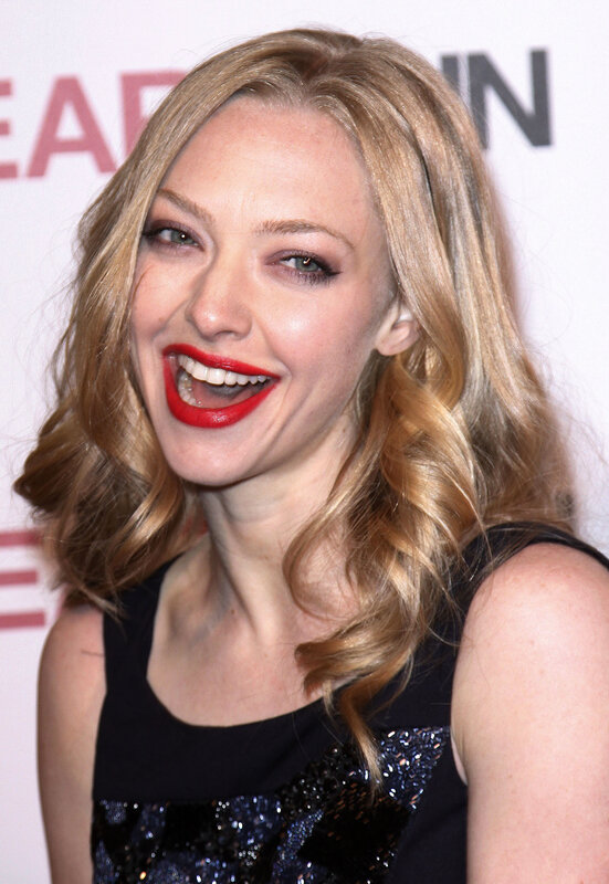 woman with red lipstick smiling