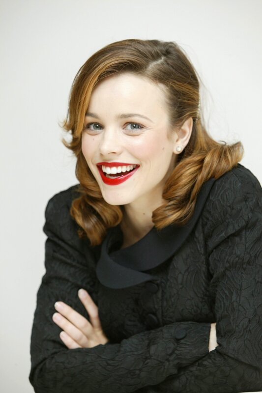 woman with red lipstick smiling