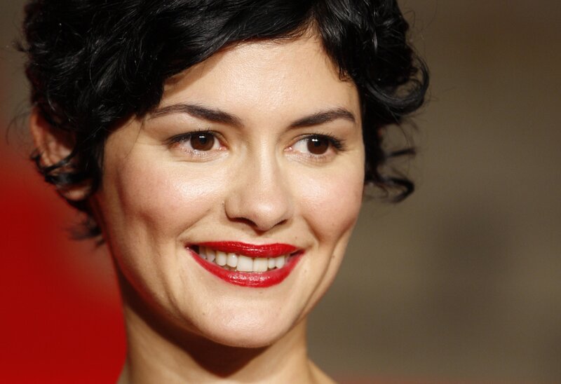 woman with red lipstick smiling
