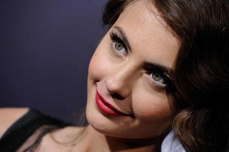 woman with red lipstick smiling