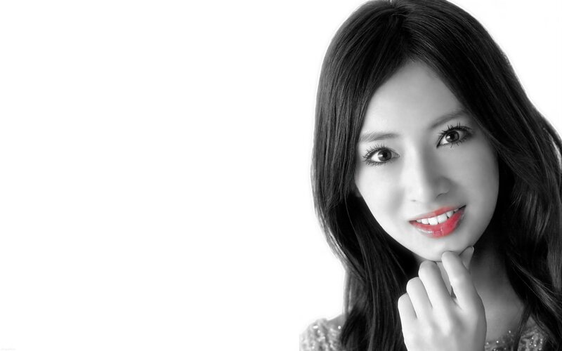 woman with red lipstick smiling