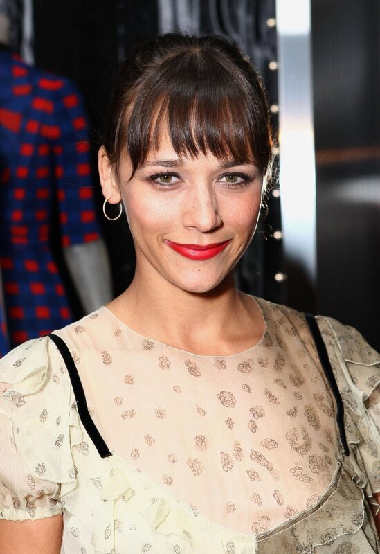 woman with red lipstick smiling