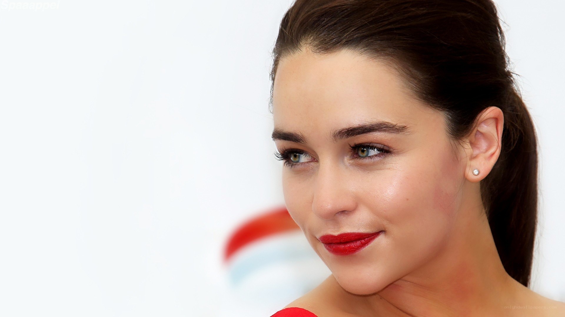 woman with red lipstick smiling