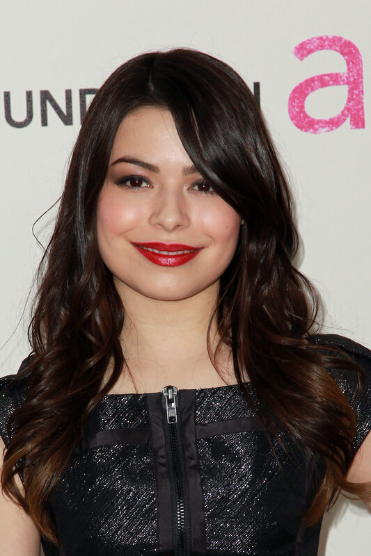 woman with red lipstick smiling