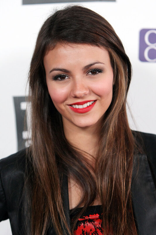 woman with red lipstick smiling
