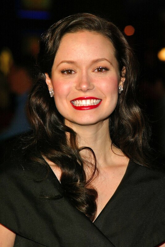 woman with red lipstick smiling