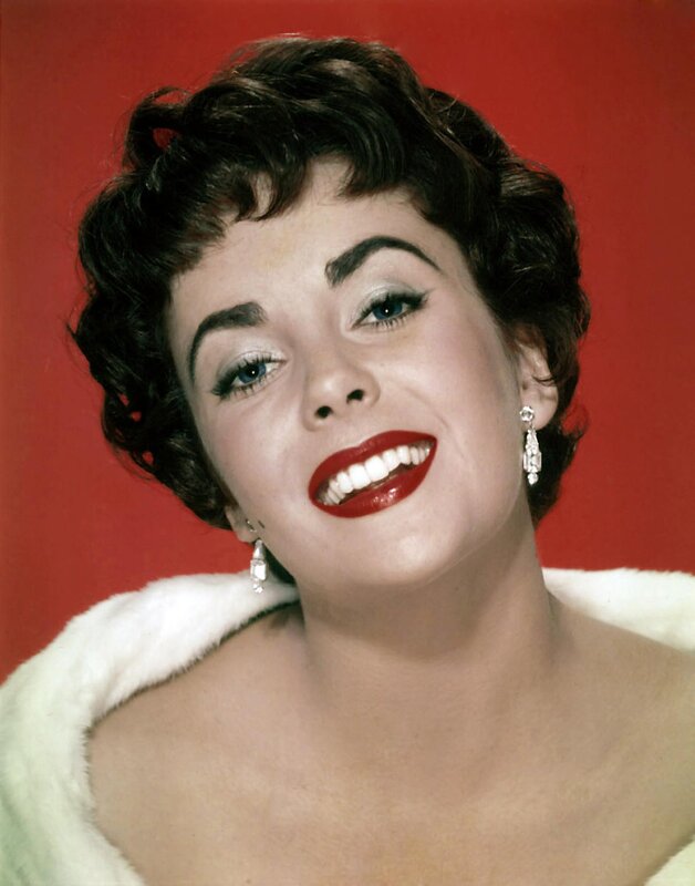 woman with red lipstick smiling