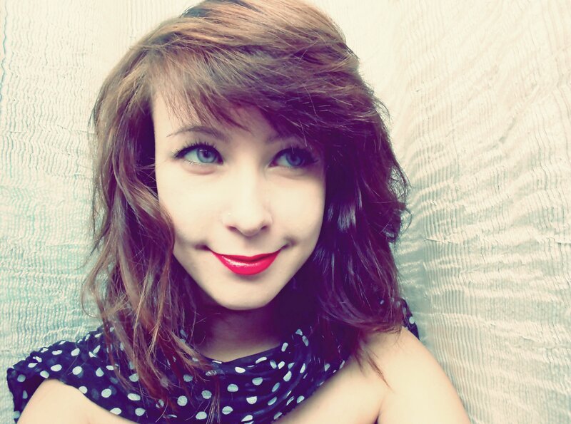 woman with red lipstick smiling