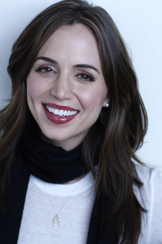 woman with red lipstick smiling