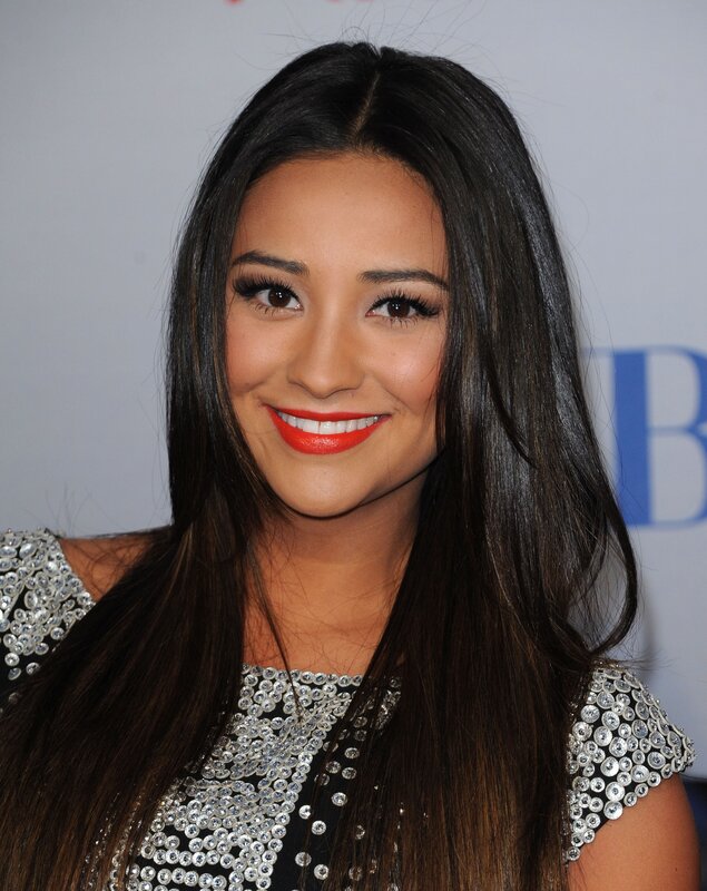 woman with red lipstick smiling