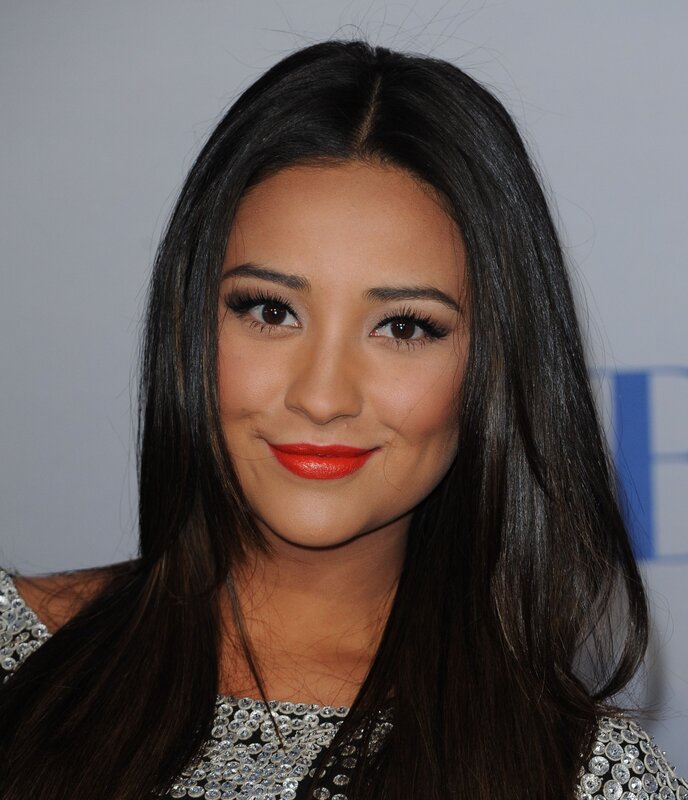 woman with red lipstick smiling