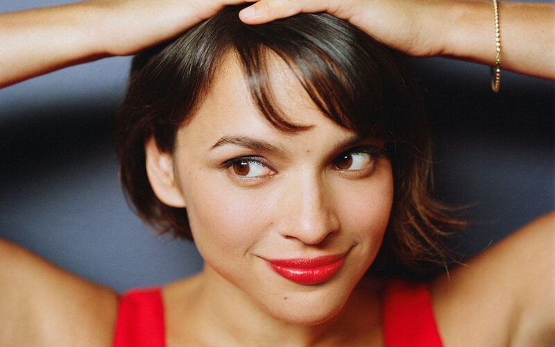 woman with red lipstick smiling