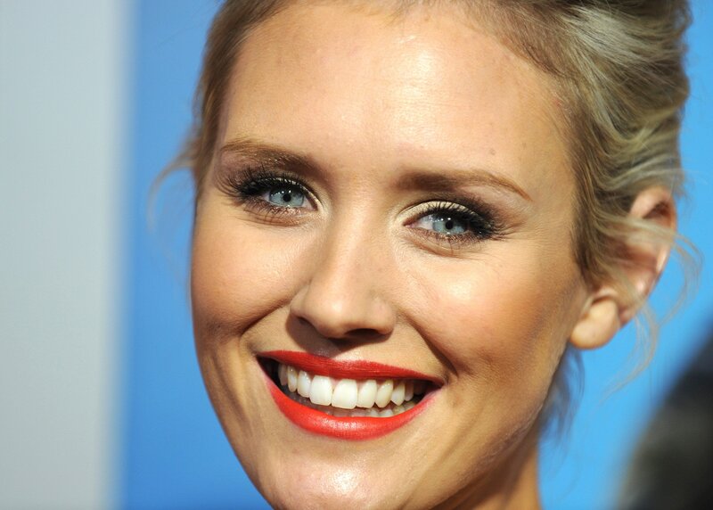woman with red lipstick smiling