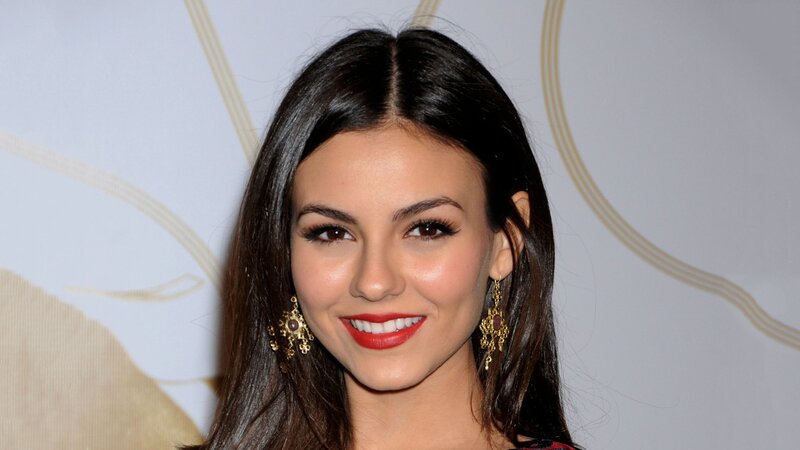 woman with red lipstick smiling