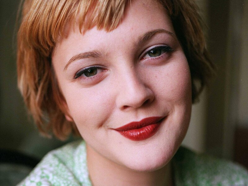 woman with red lipstick smiling