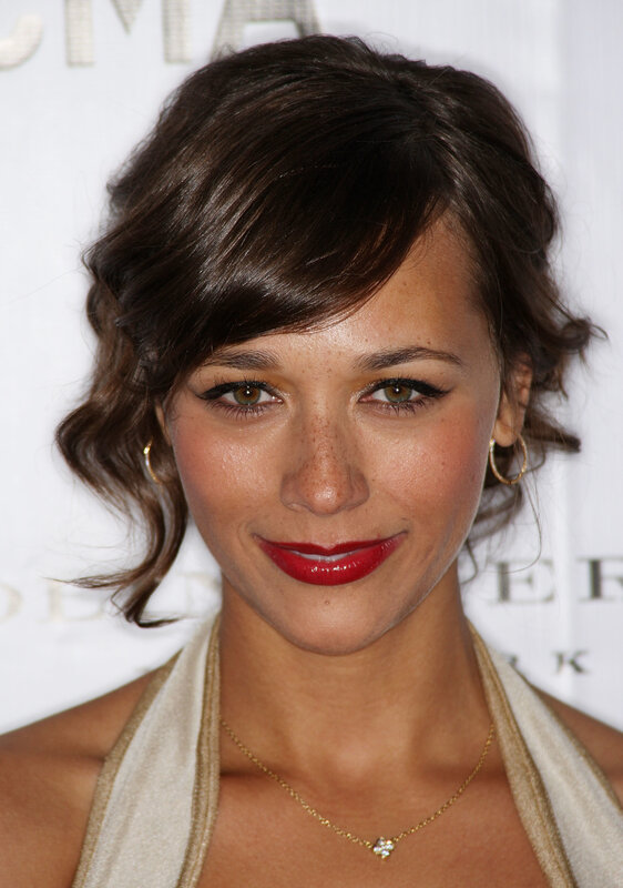 woman with red lipstick smiling