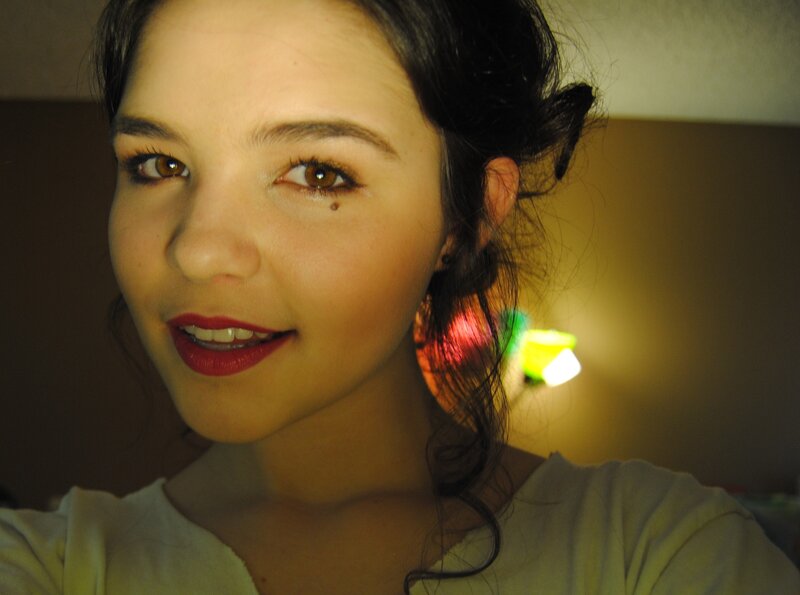 woman with red lipstick smiling