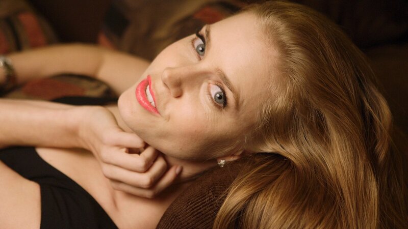 woman with red lipstick smiling