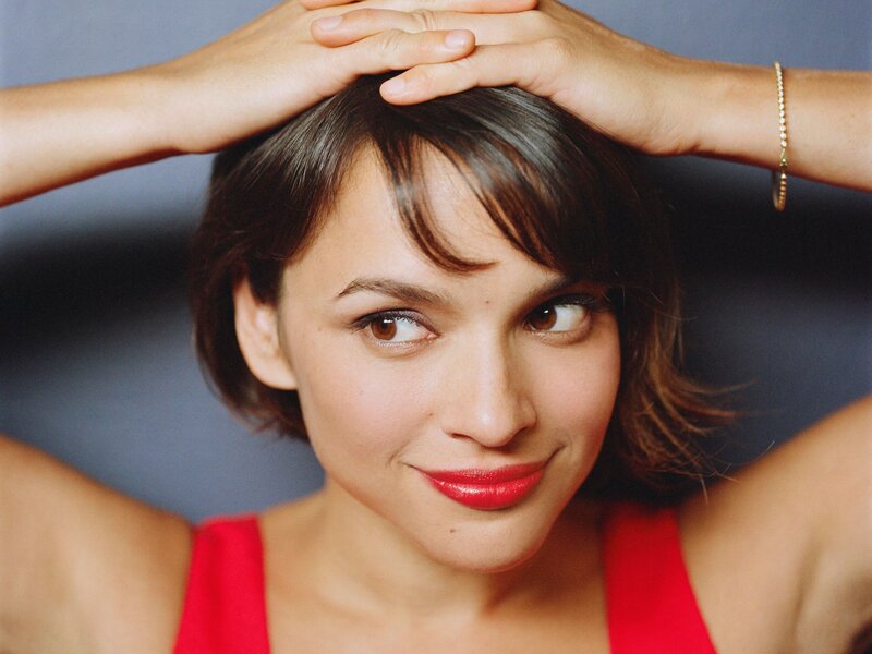 woman with red lipstick smiling