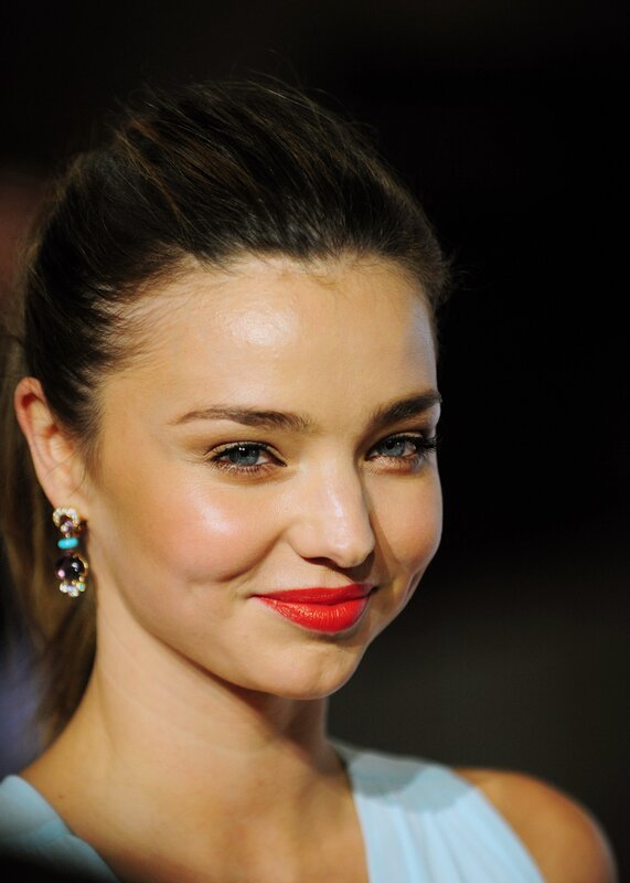 woman with red lipstick smiling