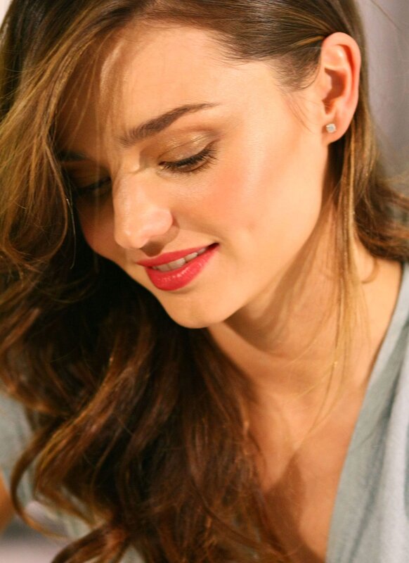woman with red lipstick smiling