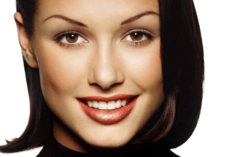woman with red lipstick smiling