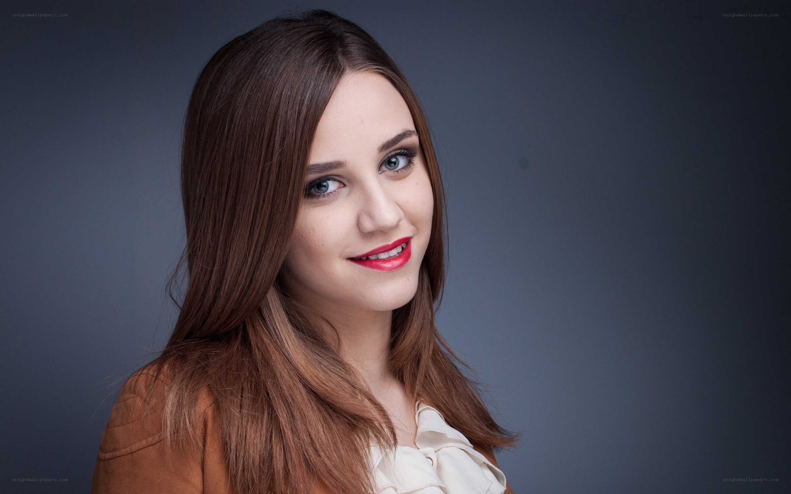 woman with red lipstick smiling